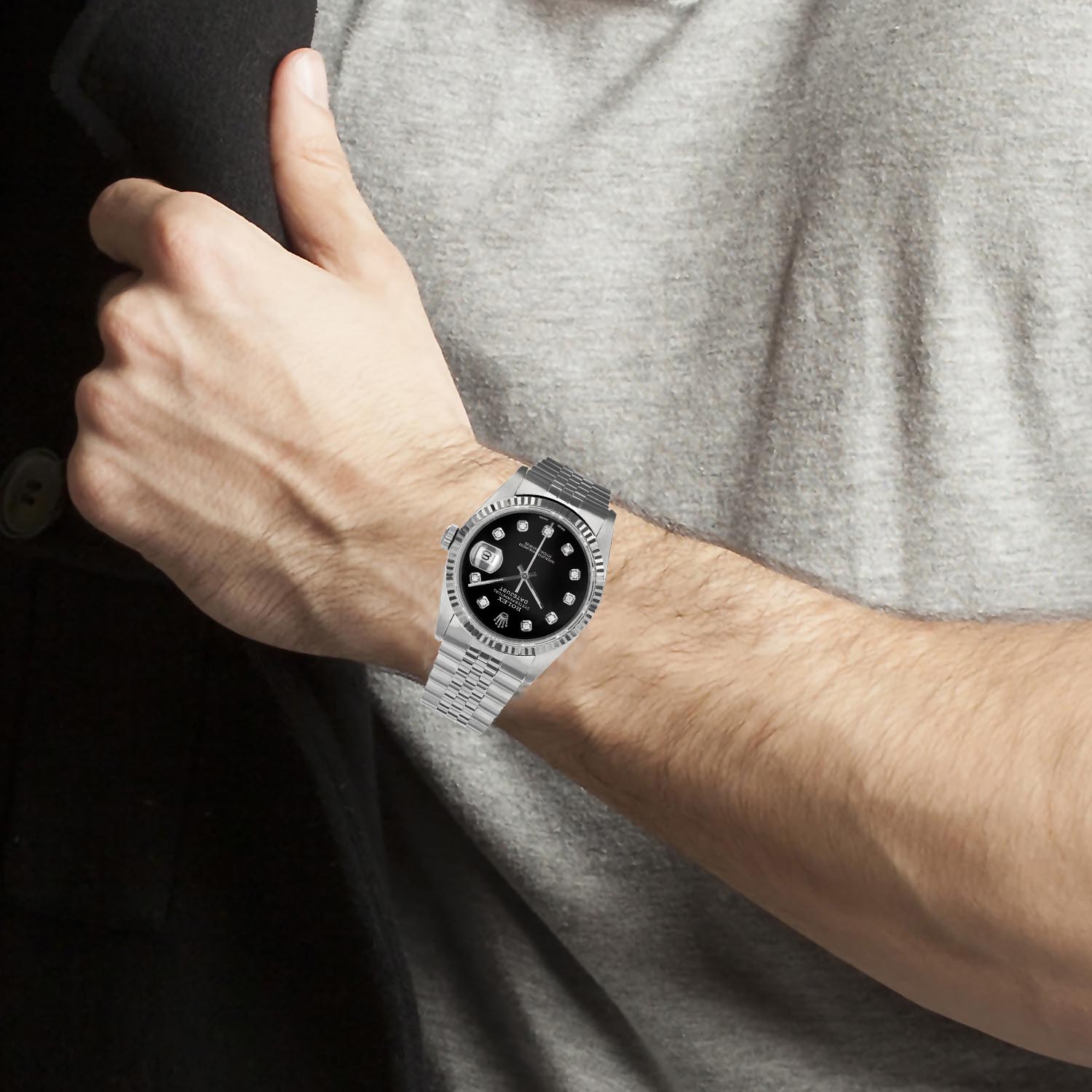 Pre Owned Rolex Oyster Perpetual Datejust with Black Diamond Dial and 18kt White Gold Fluted Bezel and Stainless Steel Jubilee Bracelet (automatic movement)