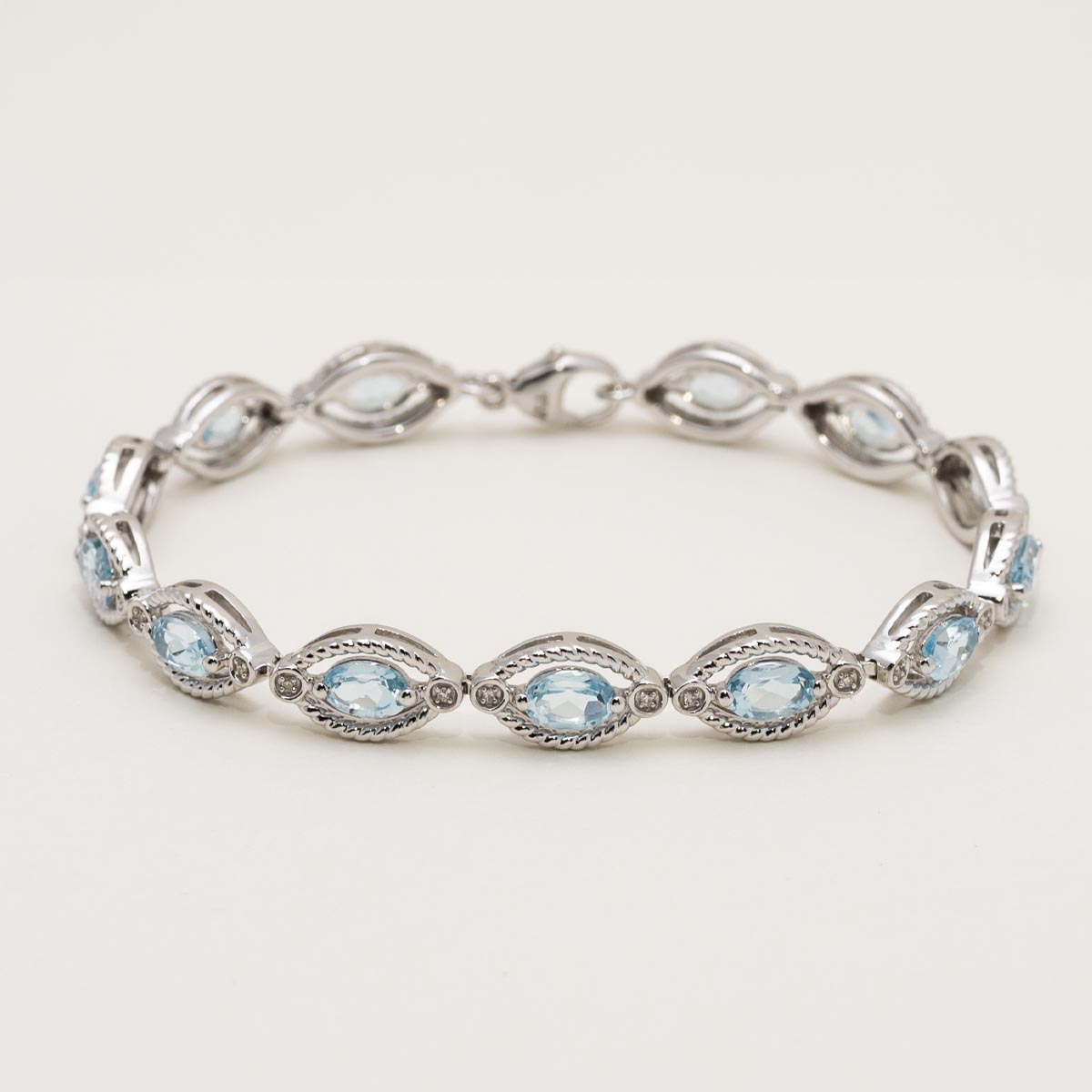 Oval Blue Topaz Bracelet in Sterling Silver with Diamonds 1 10ct tw