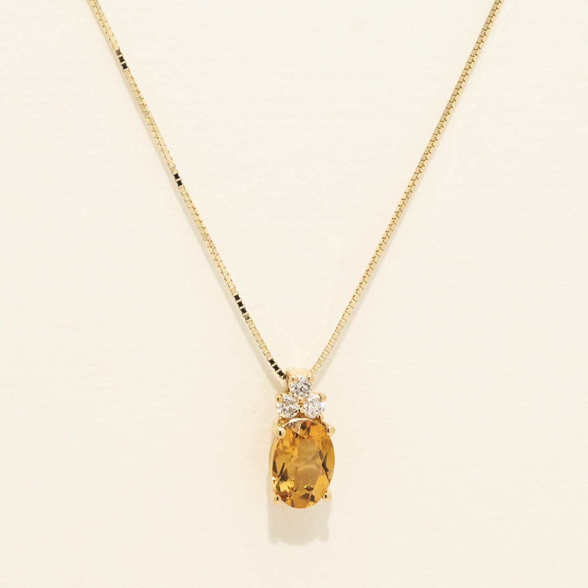 Oval Citrine Necklace in 14kt Yellow Gold with Diamonds (1/10ct tw)