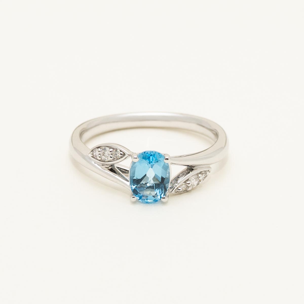 Oval Blue Topaz Ring in 14kt White Gold with Diamonds (1/10ct tw