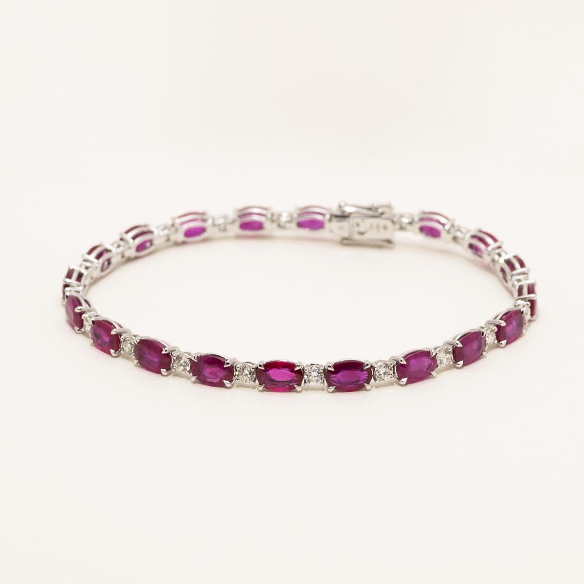 Ruby and diamond tennis shop bracelet white gold