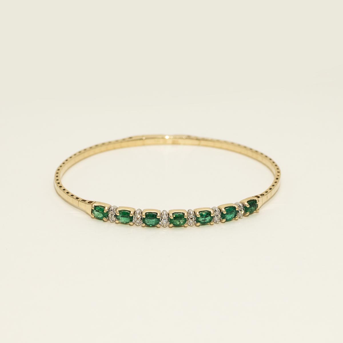 Oval Emerald Flexible Bangle Bracelet in 14kt Yellow and White