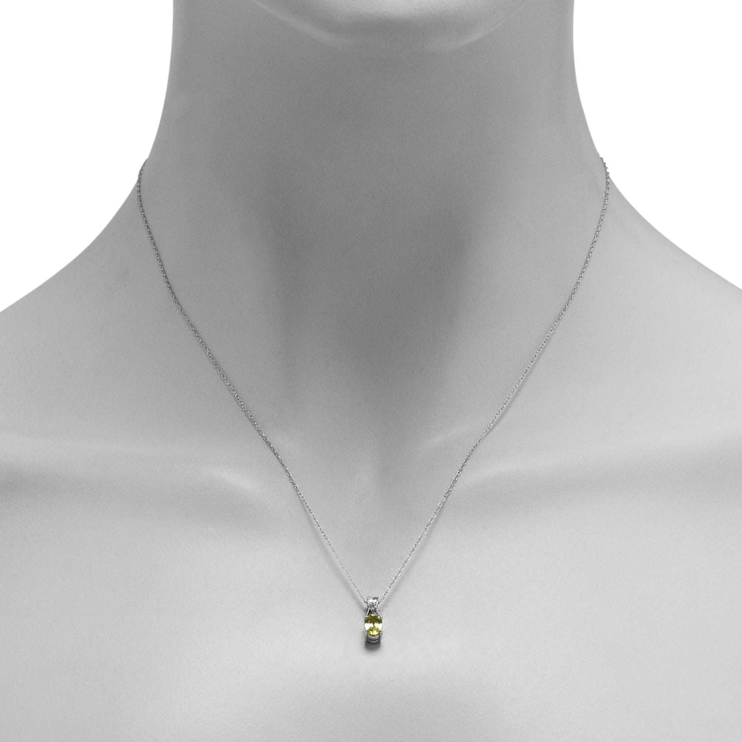 Oval Peridot Necklace in 10kt White Gold with Diamonds (1/20ct tw)