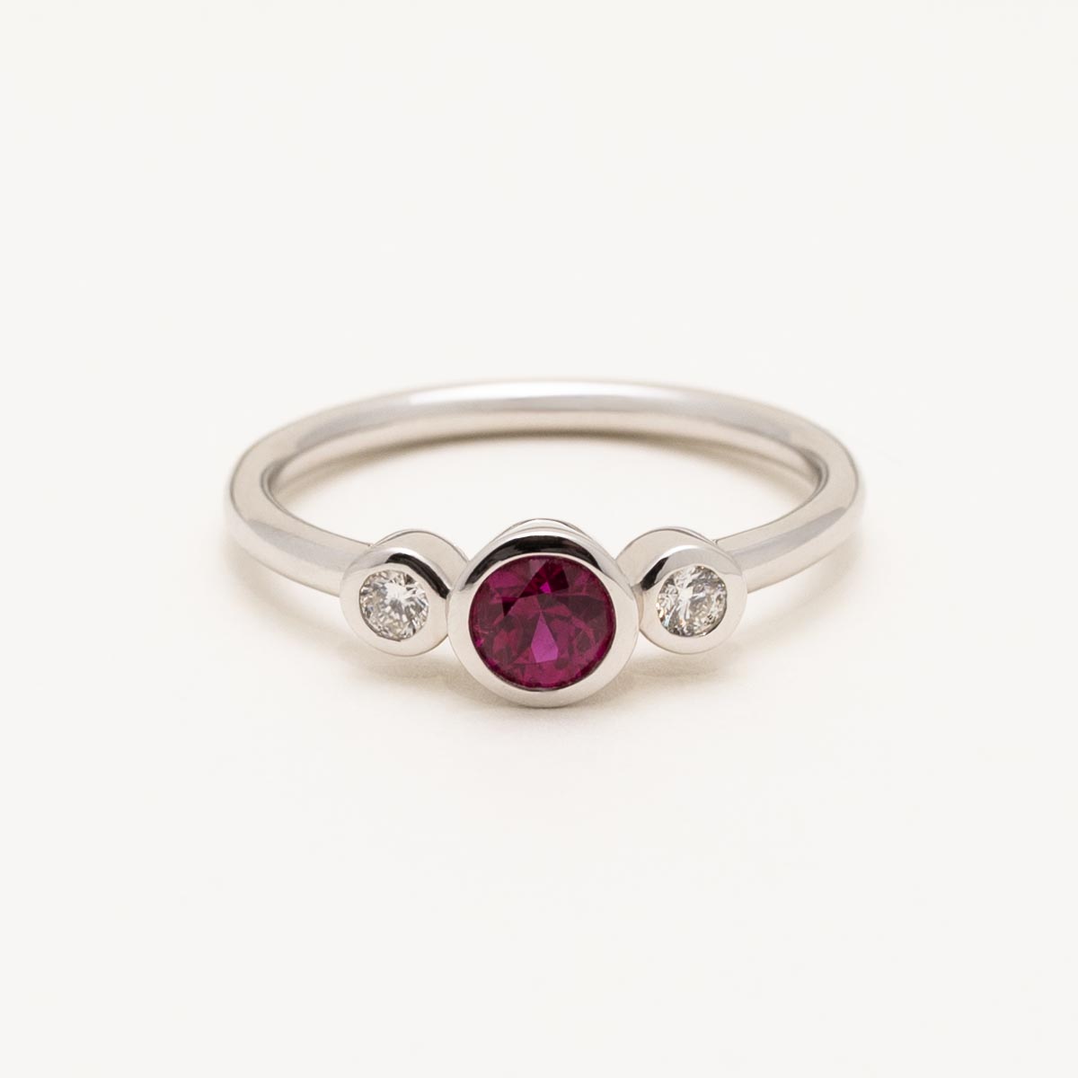 Ruby Bezel Ring in 18kt White Gold with Diamonds (1/10ct tw)