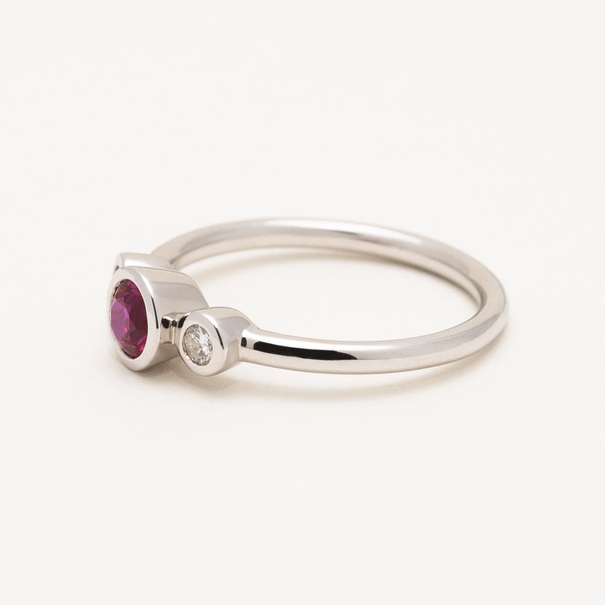 Ruby Bezel Ring in 18kt White Gold with Diamonds (1/10ct tw)