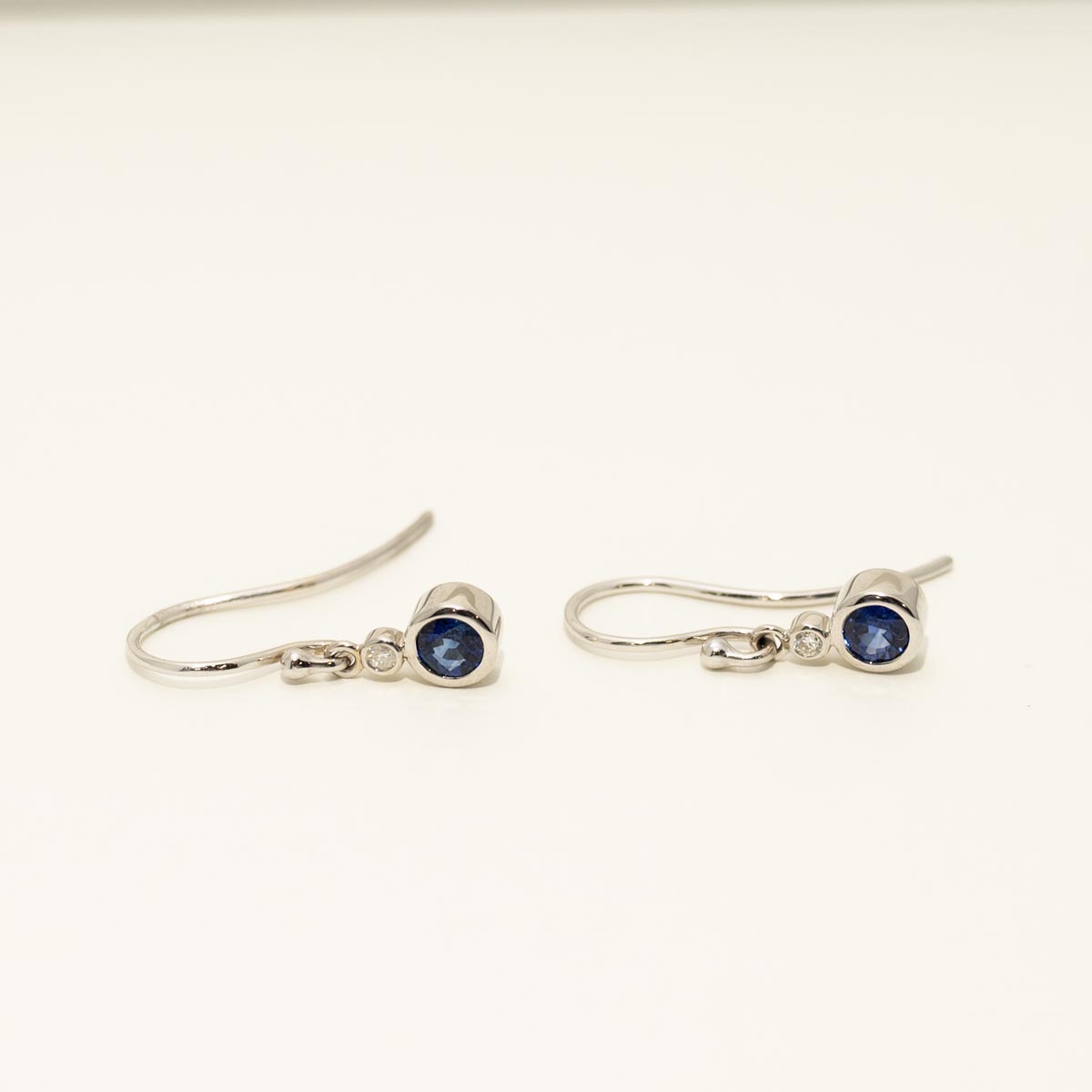 Sapphire Bezel Drop Earrings in 18kt White Gold with Diamonds (1/20ct tw)