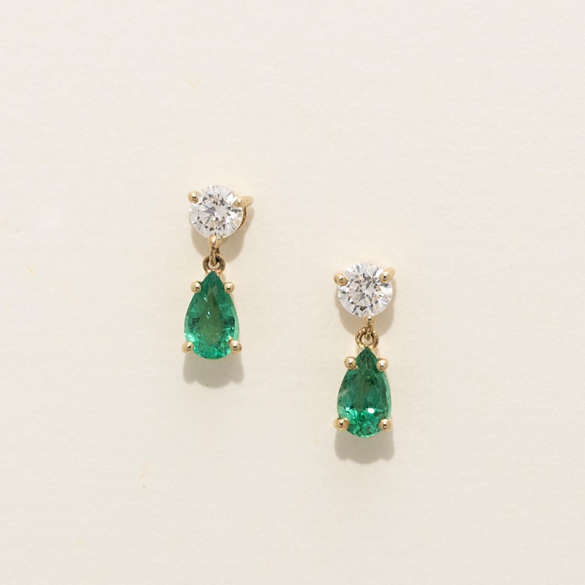 Pear Shape Emerald Drop Earrings in 14kt Yellow Gold with Diamonds (1/5ct tw)