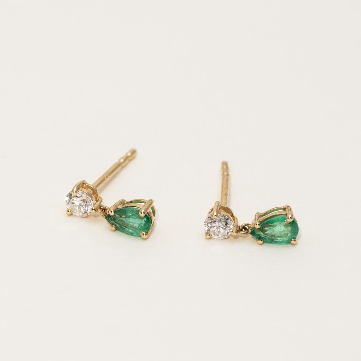 Pear Shape Emerald Drop Earrings in 14kt Yellow Gold with Diamonds (1/5ct tw)
