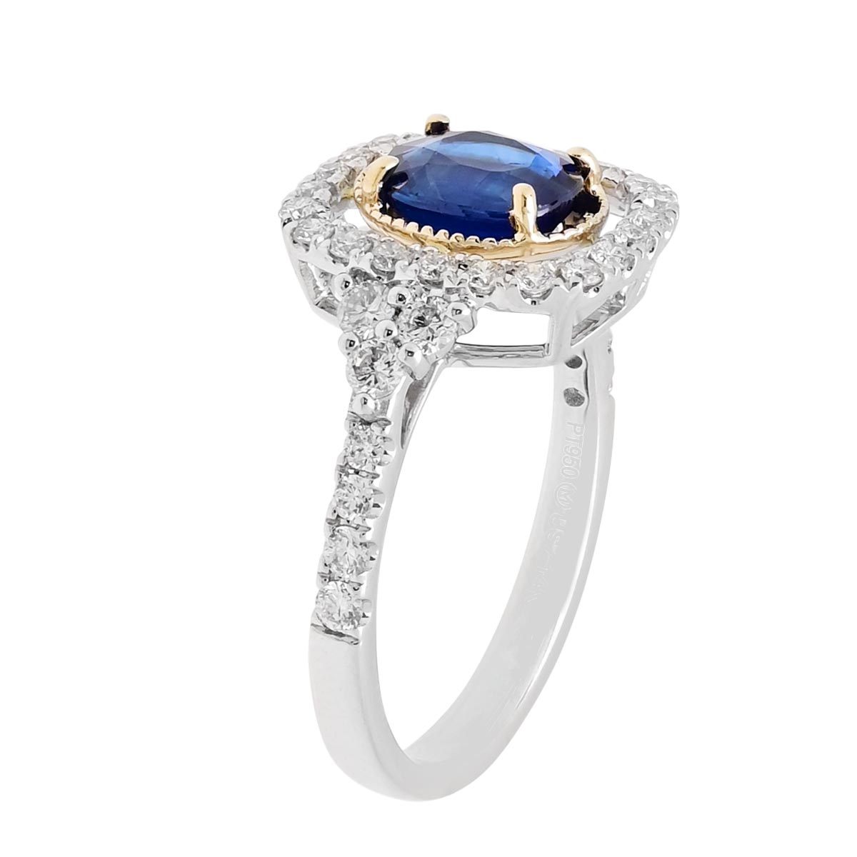 Oval Sapphire Ring in Platinum and 14kt Yellow Gold with Diamonds (5/8ct tw)