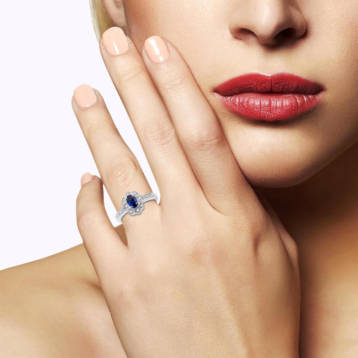 Oval Sapphire Ring in Sterling Silver with Diamonds (1/20ct tw)