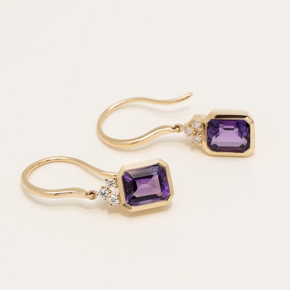 Emerald Cut Amethyst Drop Earrings in 14kt Yellow Gold with Diamonds (1/10ct tw)