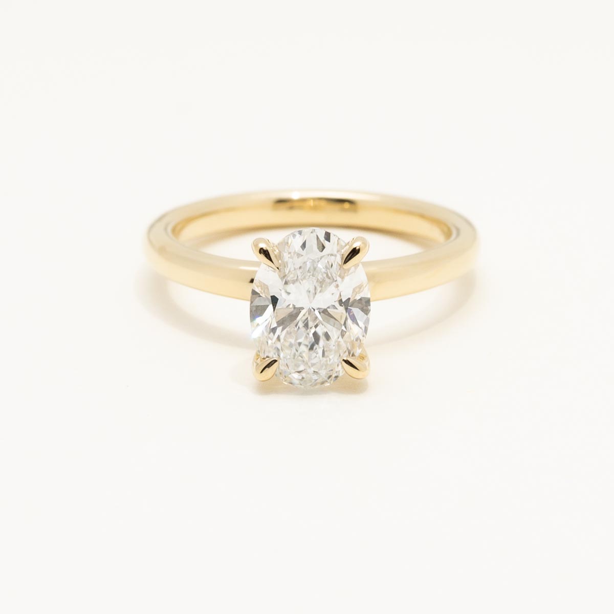 Lab Grown Oval Diamond Solitaire Engagement Ring in 14kt Yellow Gold (2ct tw)