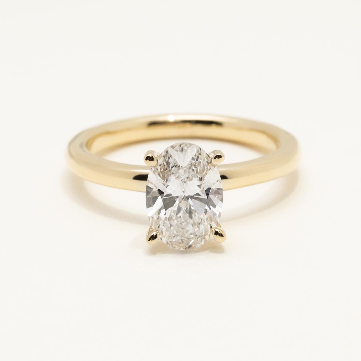 Lab Grown Oval Diamond Solitaire Engagement Ring in 14kt Yellow Gold (1 1/2ct)