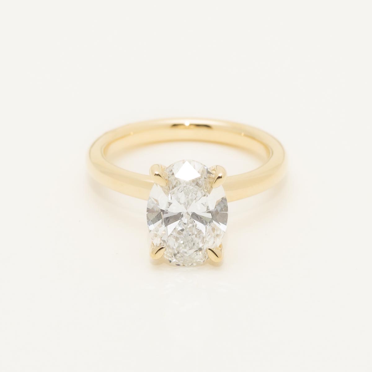 Lab Grown Oval Diamond Solitaire Ring in 14kt Yellow Gold (3ct tw)