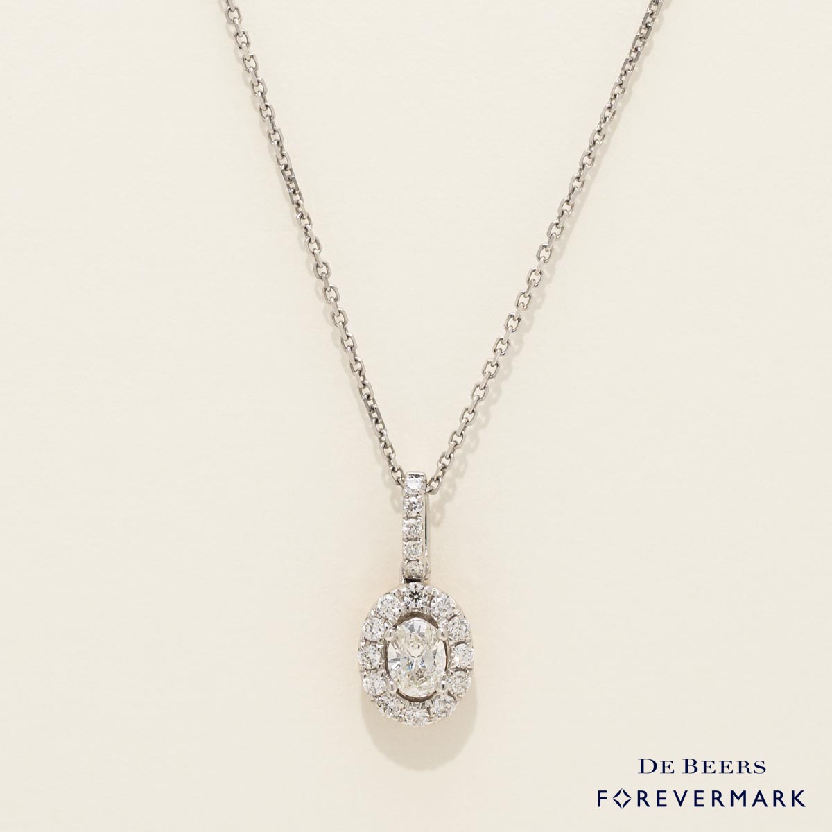 De Beers Forevermark Center of my Universe Oval Diamond Halo Necklace in 18kt White and Rose Gold (1/2ct tw)