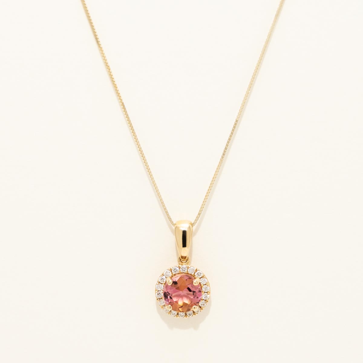 Pink Tourmaline Halo Necklace in 14kt Yellow Gold with Diamonds (1/7ct tw)