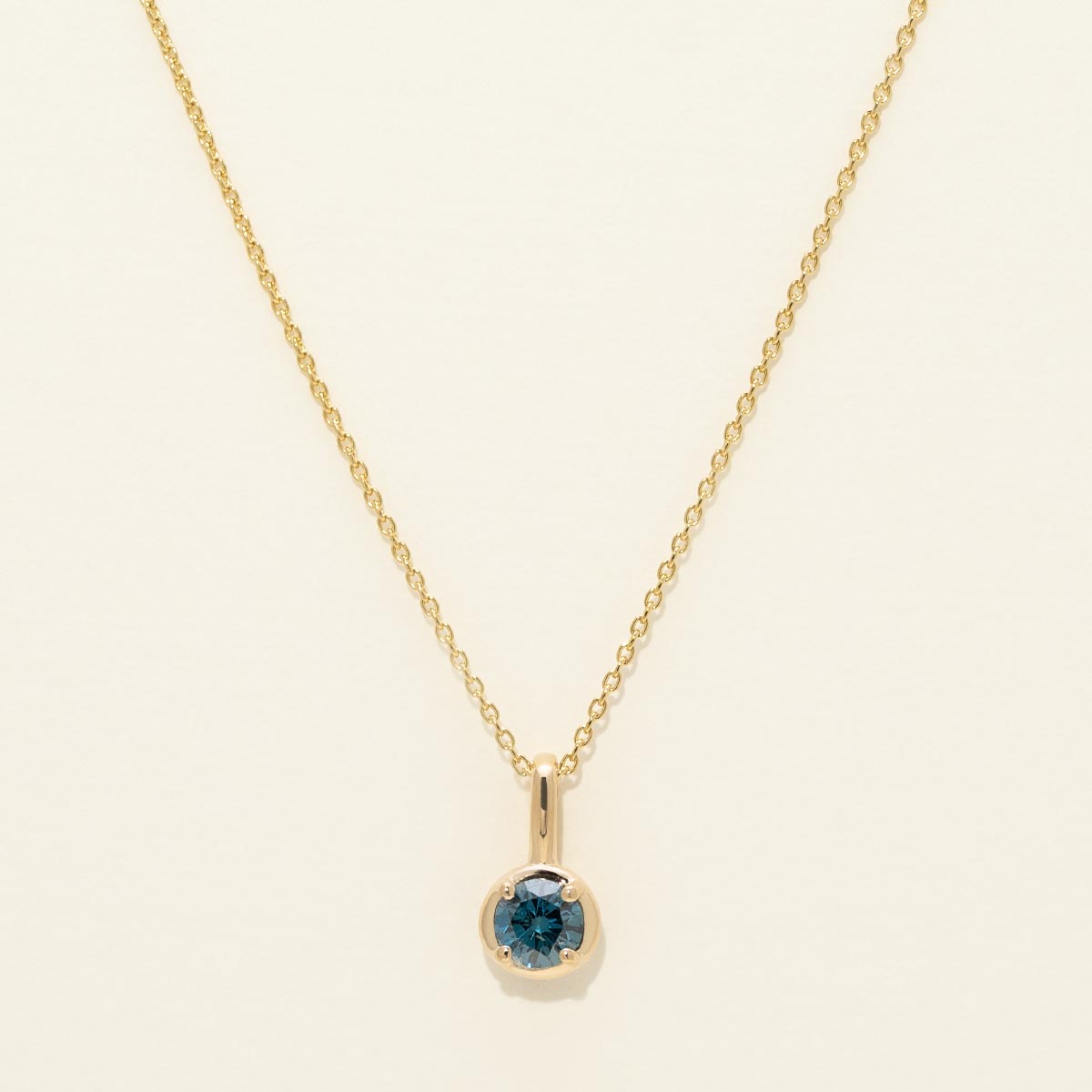 Blue Diamond Solitaire Necklace in 14kt Yellow Gold (1/3ct)