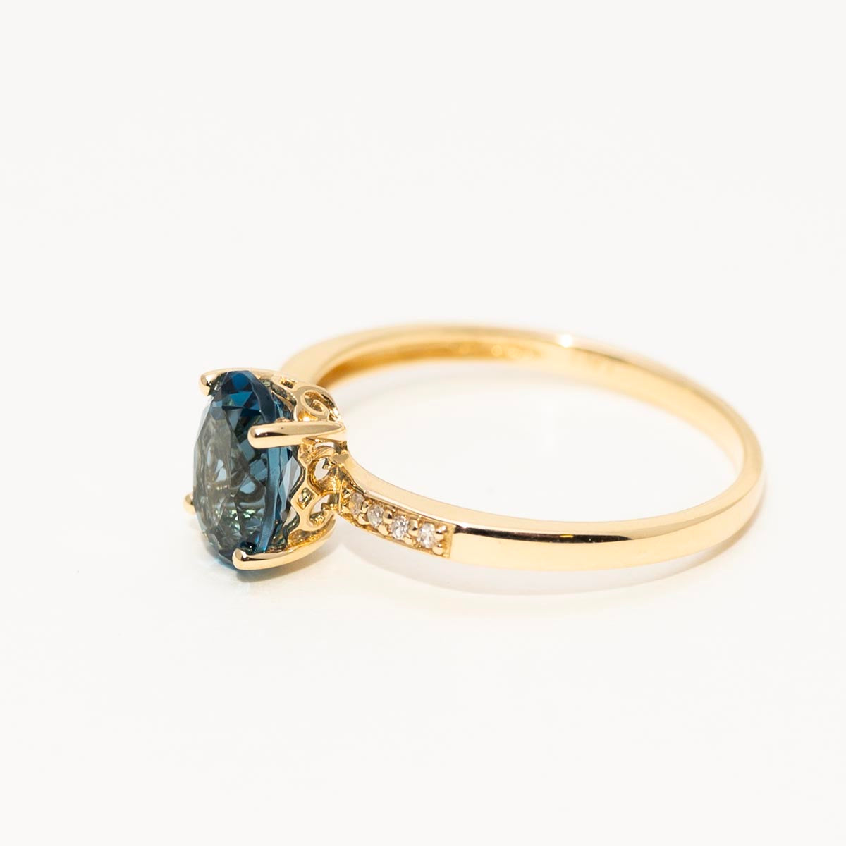 Oval London Blue Topaz Ring in 14kt Yellow Gold with Diamonds (.03ct tw)