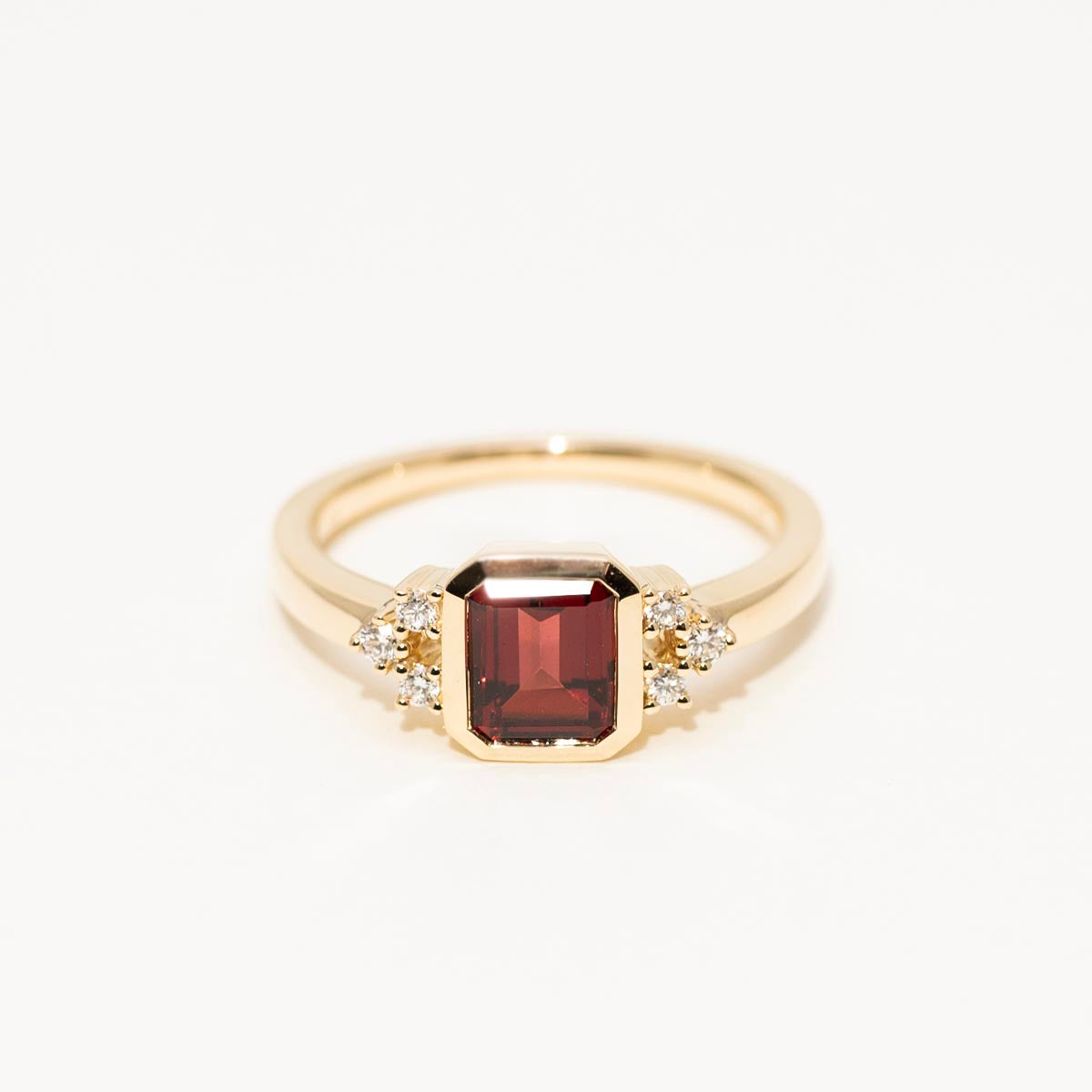 Emerald Cut Garnet Ring in 14kt Yellow Gold with Diamonds (1/10ct tw)