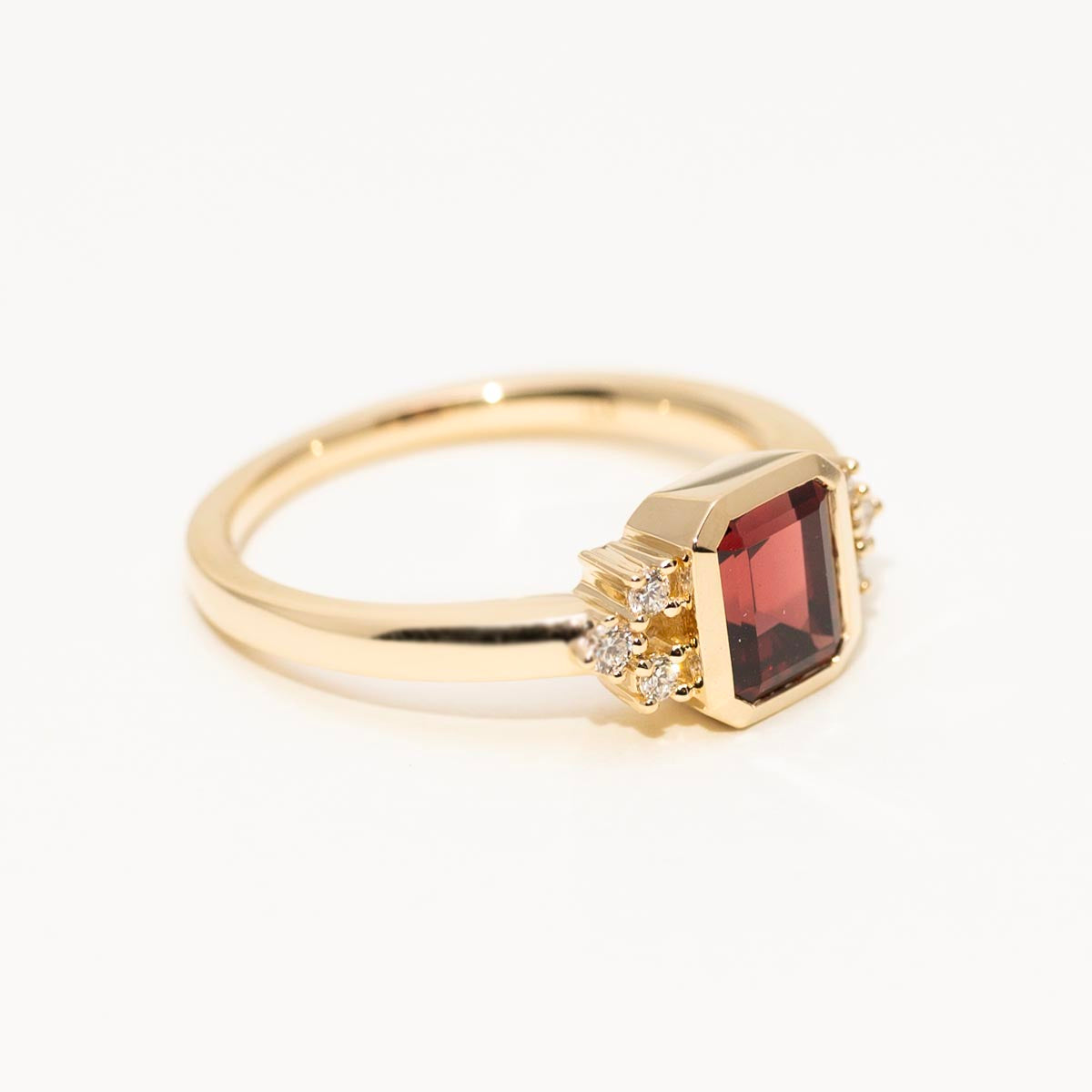 Emerald Cut Garnet Ring in 14kt Yellow Gold with Diamonds (1/10ct tw)