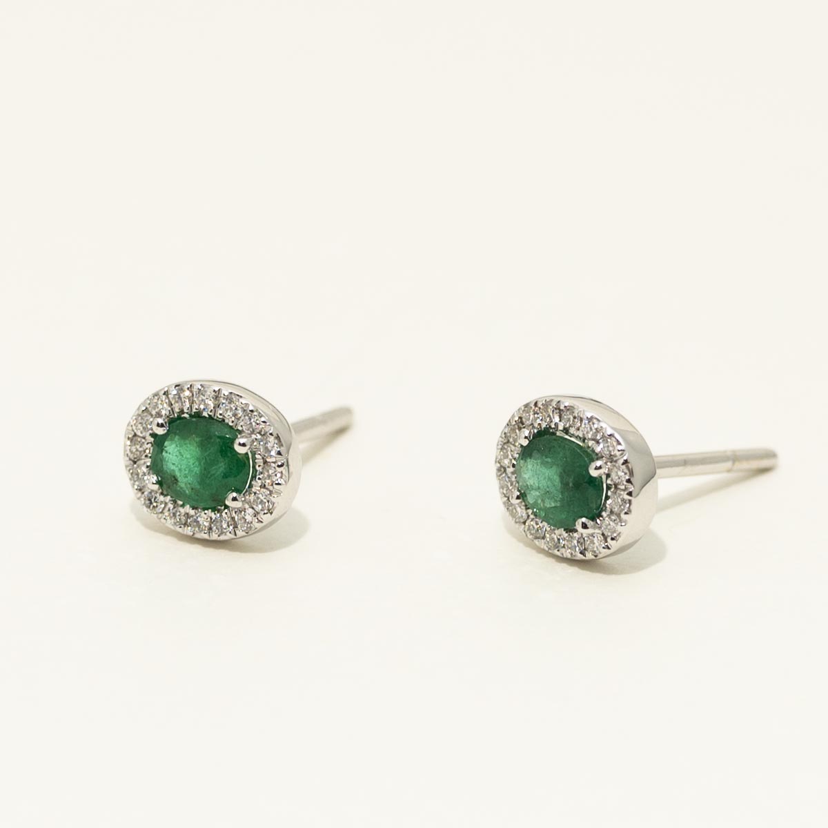 Oval Emerald Halo Earrings in 14kt White Gold with Diamonds (1/7ct tw)