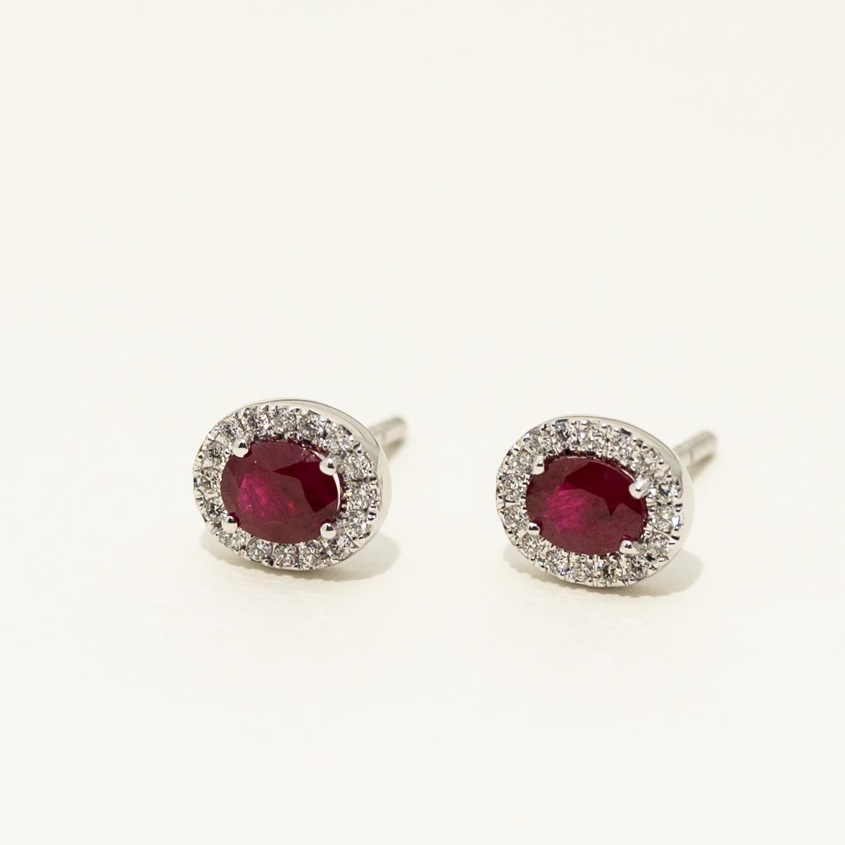 Oval Ruby Halo Earrings in 14kt White Gold with Diamonds (1/7ct tw)