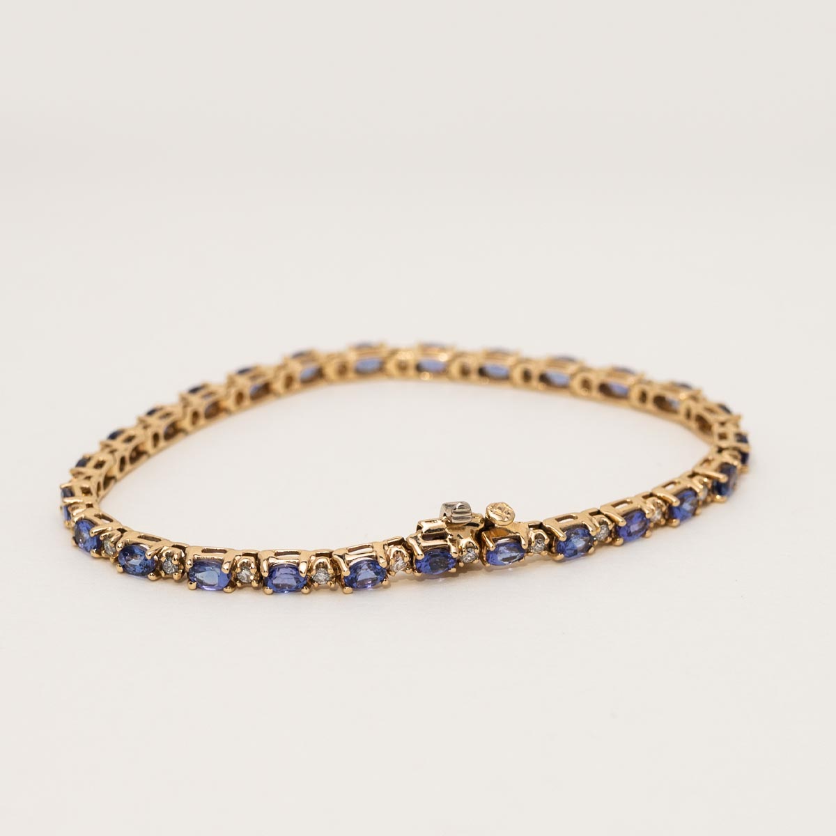 Oval Tanzanite Bracelet in 14kt Yellow Gold with Diamonds (1/2ct tw)