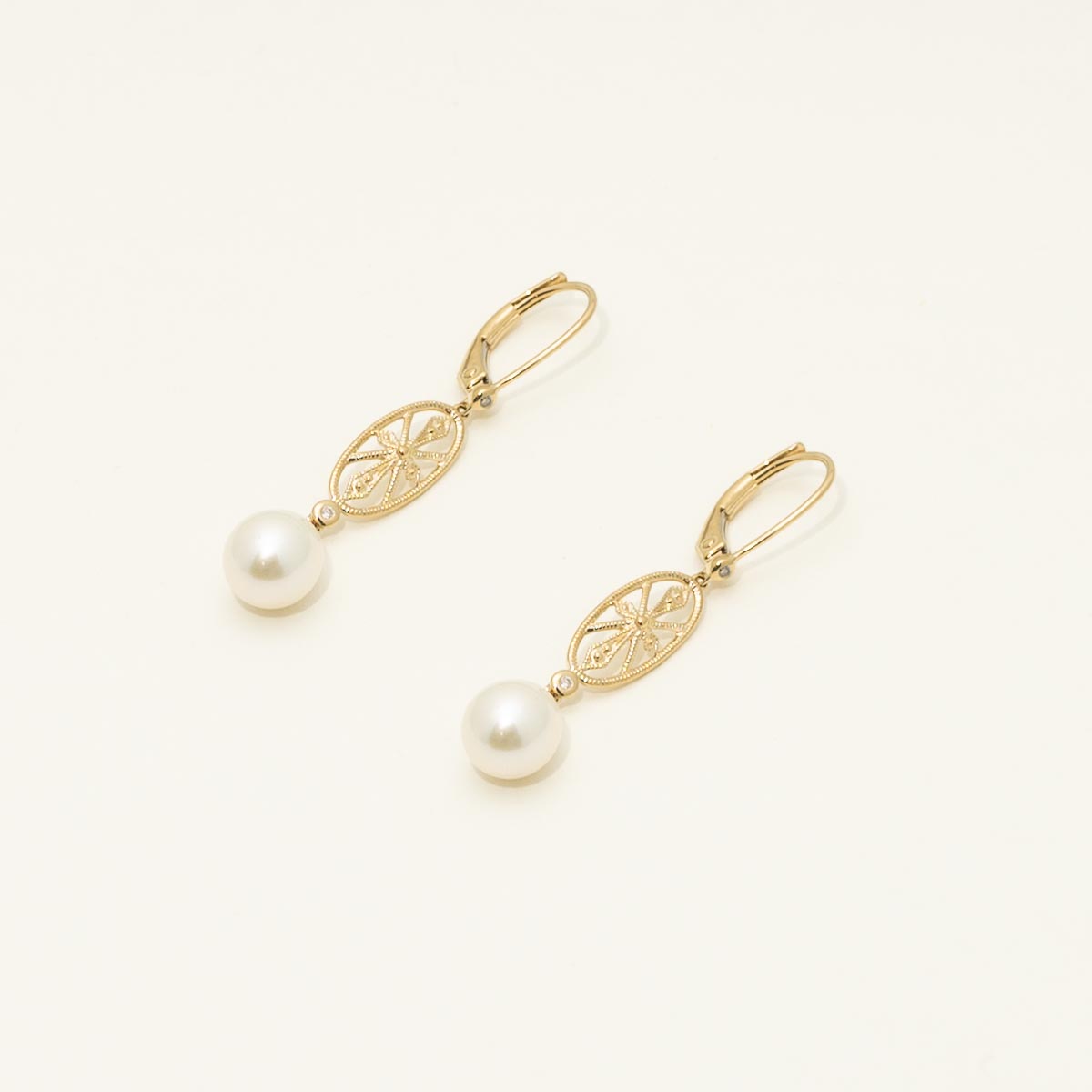 Cultured Freshwater Pearl Drop Earrings in 14kt Yellow Gold with Diamonds ( .03ct tw with 6.5mm pearls)