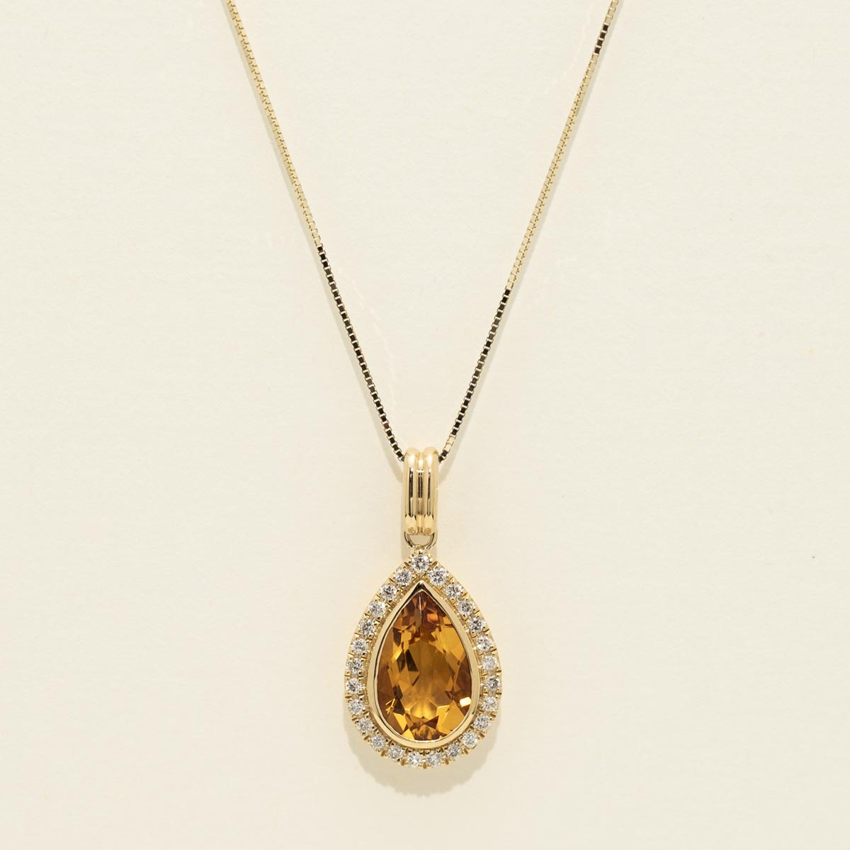 Pear Shaped Citrine Necklace in 14kt Yellow Gold with Diamonds (1/5 ct tw)