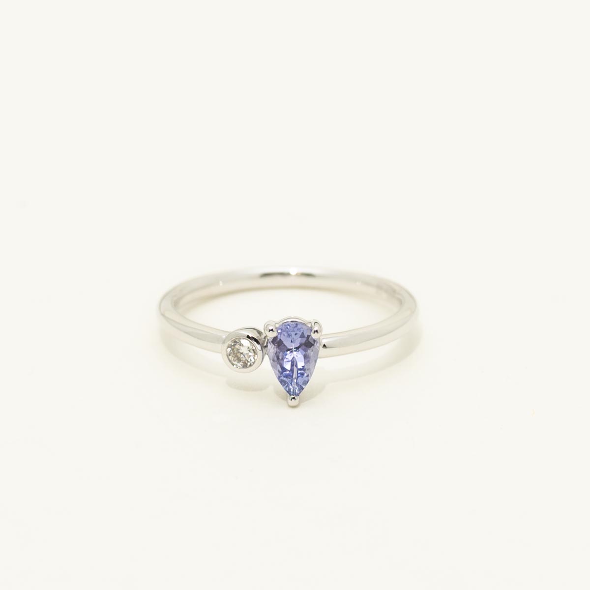Pear Shape Tanzanite Ring in 14kt White Gold with Diamond (1/20ct)