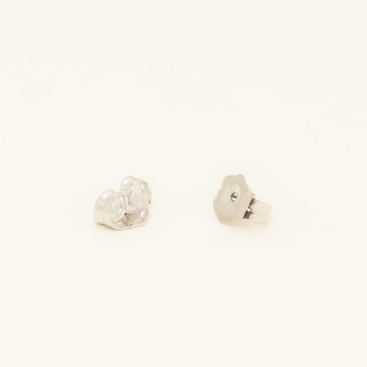 Trillion Cut Rhodolite Garnet Stud Earrings in 14kt White Gold