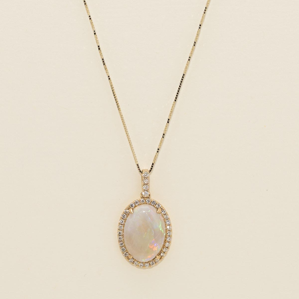 Oval Opal Necklace in 14kt Yellow Gold with Diamonds (1/4ct tw)