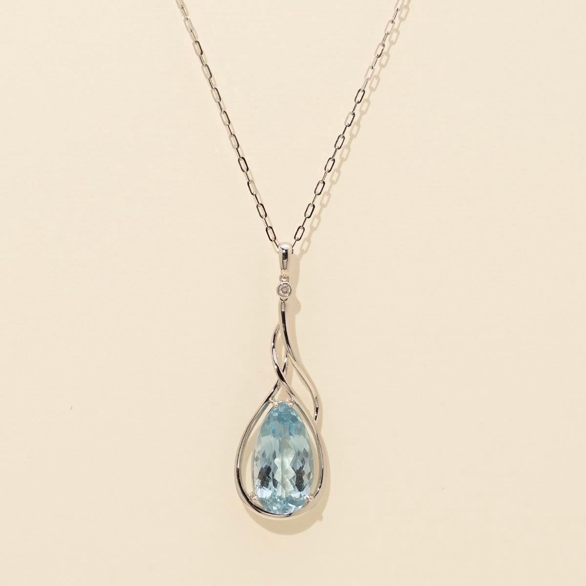 Pear Blue Topaz Necklace in 14kt White Gold with a Diamond (.03ct tw)