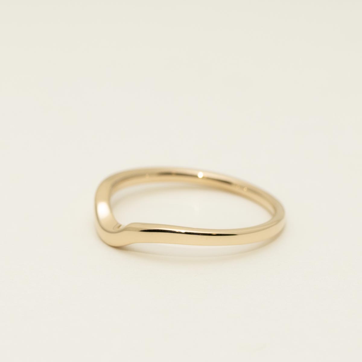 High Polish Curved Wedding Band in 14kt Yellow Gold