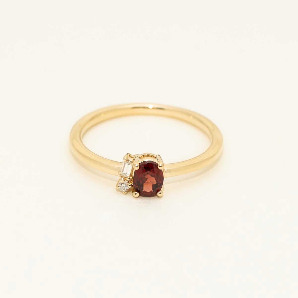 Oval Garnet Ring in 14kt Yellow Gold with Diamonds (1/20ct tw)