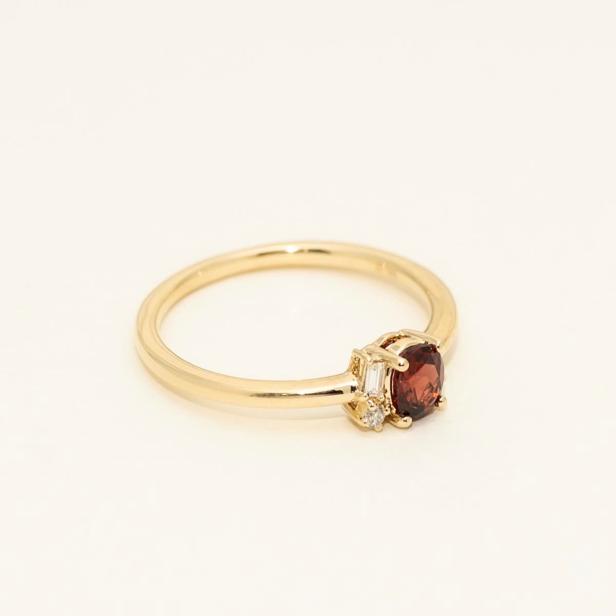 Oval Garnet Ring in 14kt Yellow Gold with Diamonds (1/20ct tw)