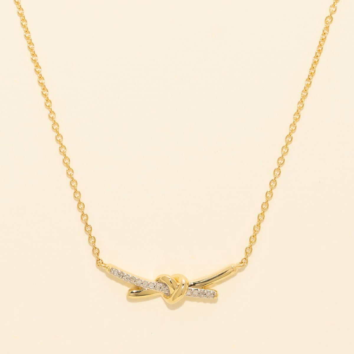 Diamond Love Knot Necklace in 10kt Yellow Gold (1/20ct tw)