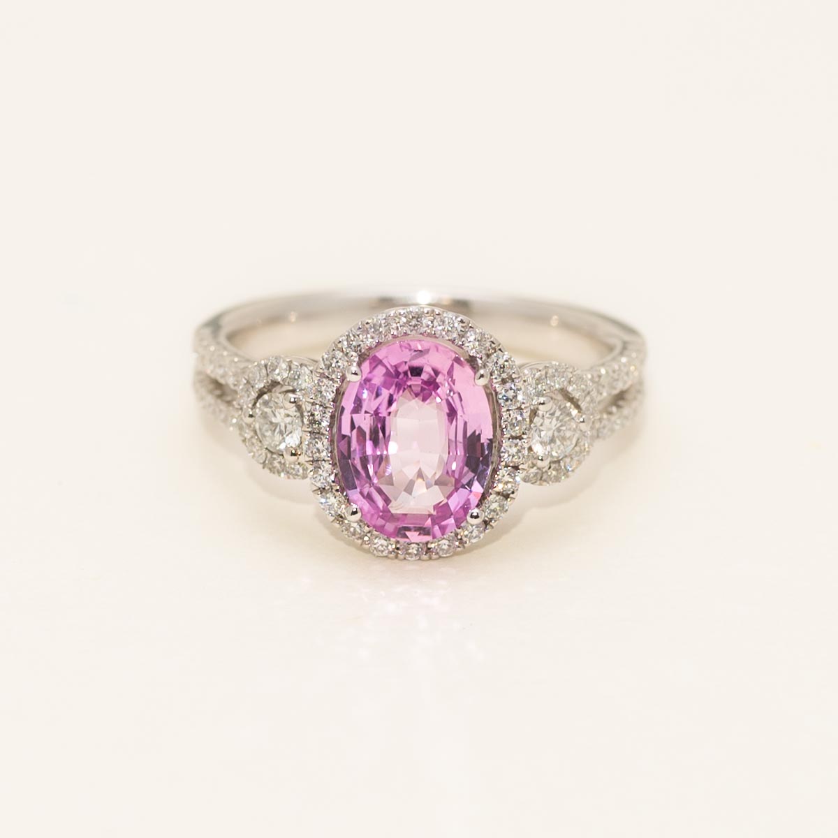 Oval Pink Sapphire Halo Ring in 18kt White Gold Diamonds (5/8ct tw)