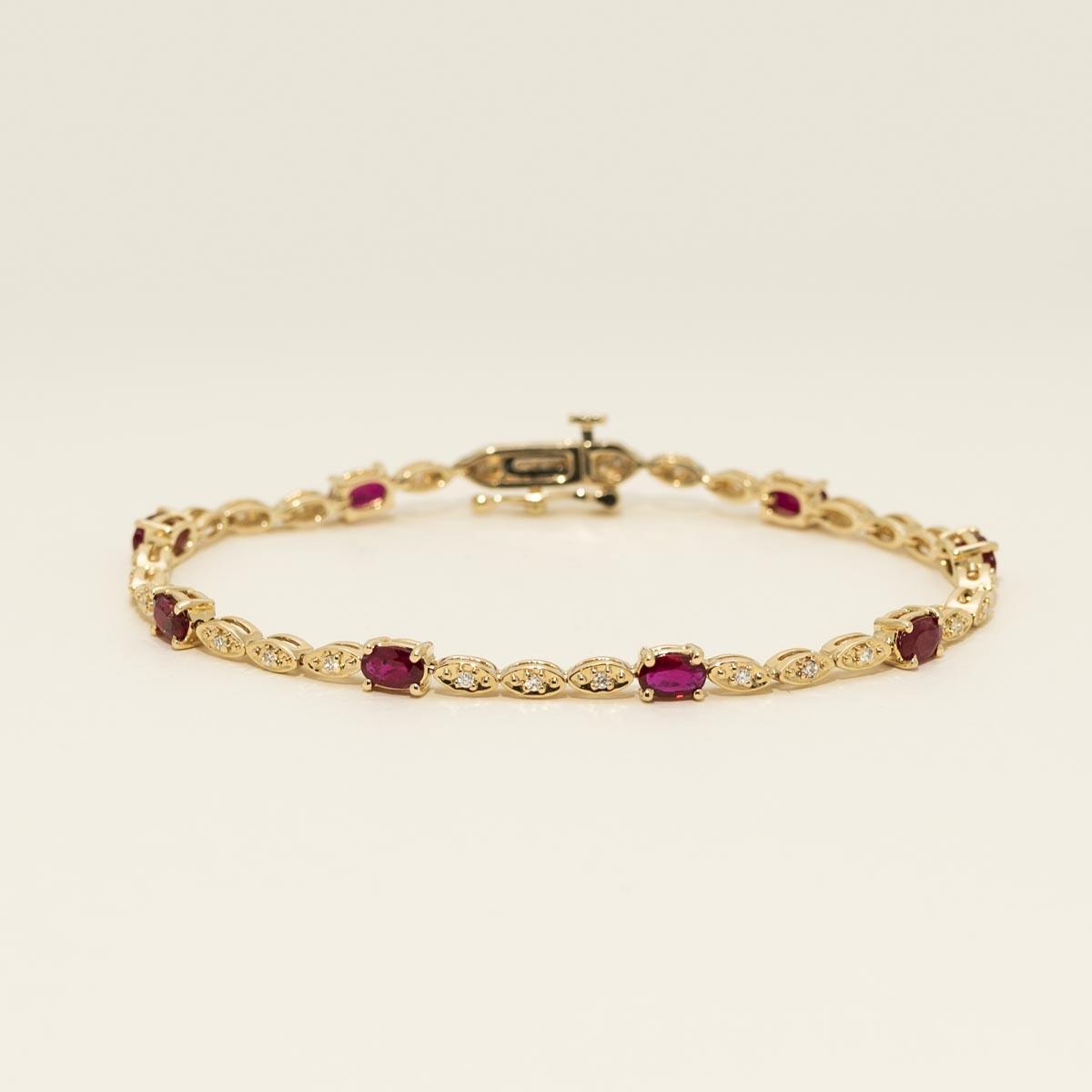 Oval Ruby Bracelet in 14kt Yellow Gold with Diamonds (1/5ct tw)