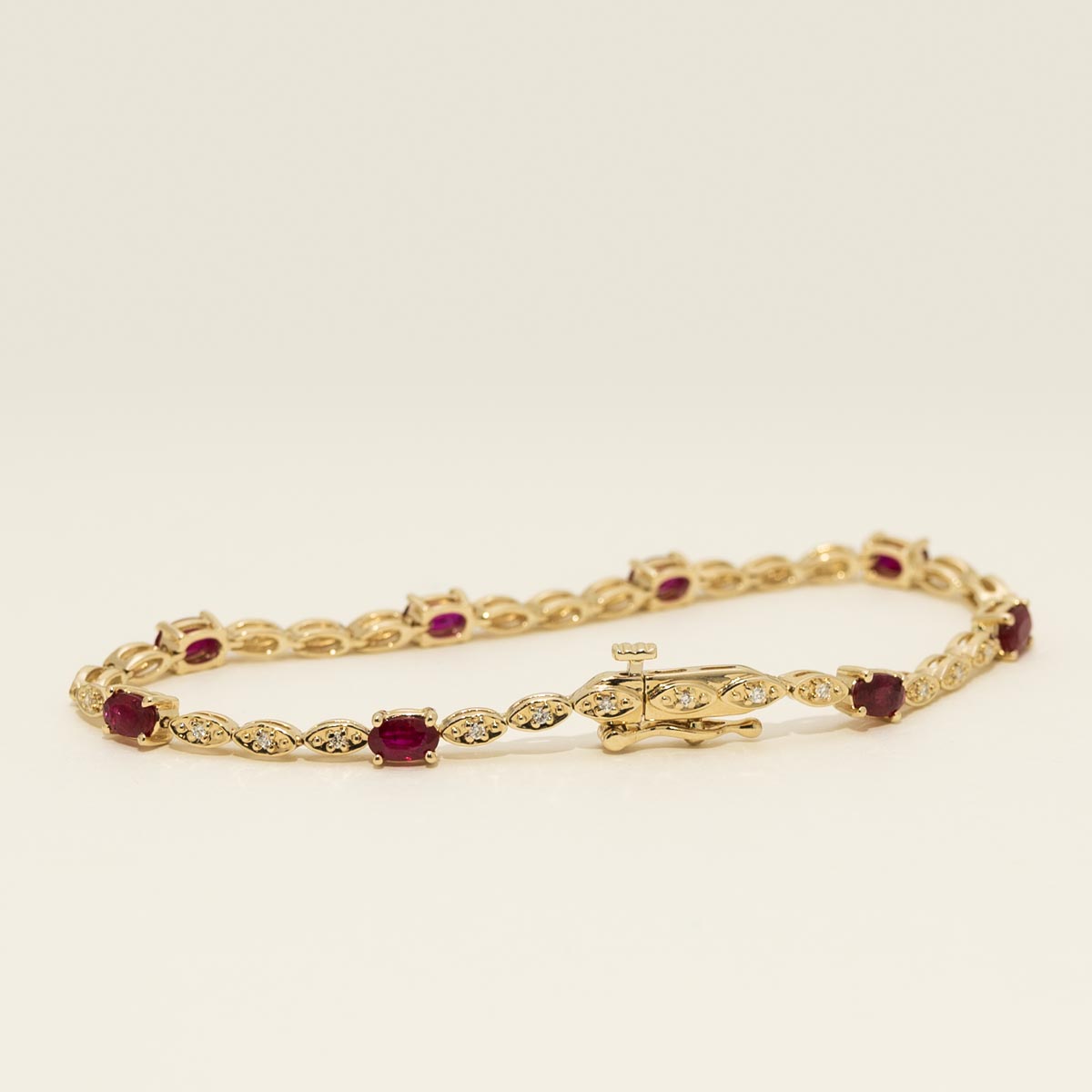 Oval Ruby Bracelet in 14kt Yellow Gold with Diamonds (1/5ct tw)