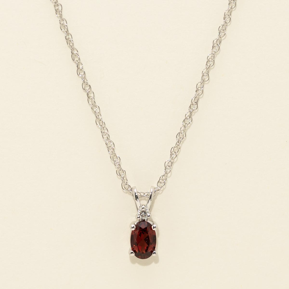 Oval Garnet Necklace in 14kt White Gold with Diamond  (.02 ct)