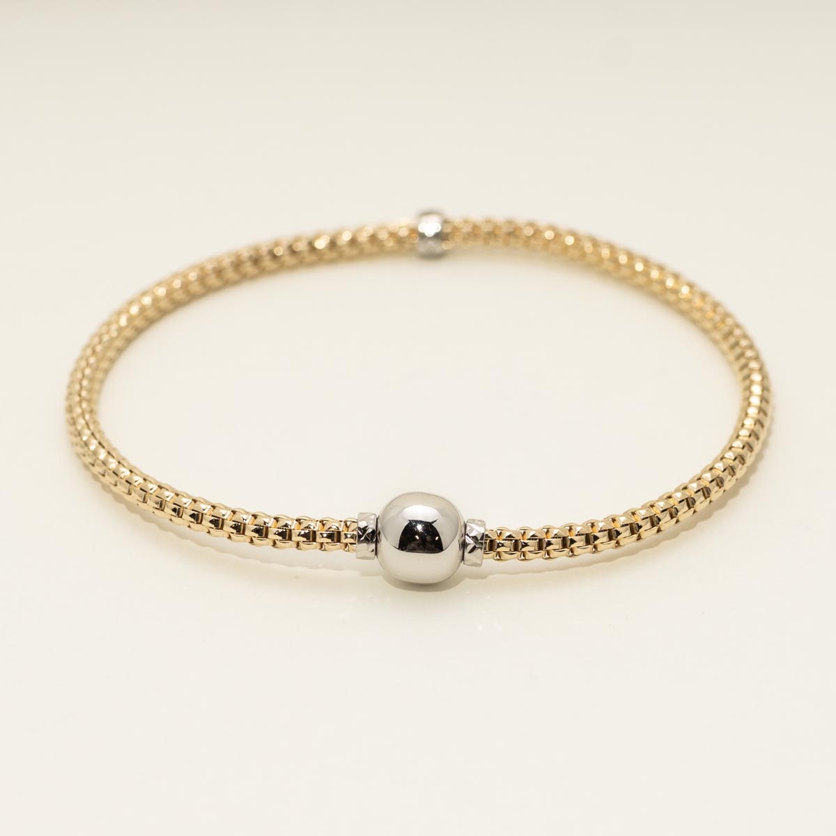 Italian Woven Bracelet in 14kt Yellow Gold with 14kt White Gold Accents