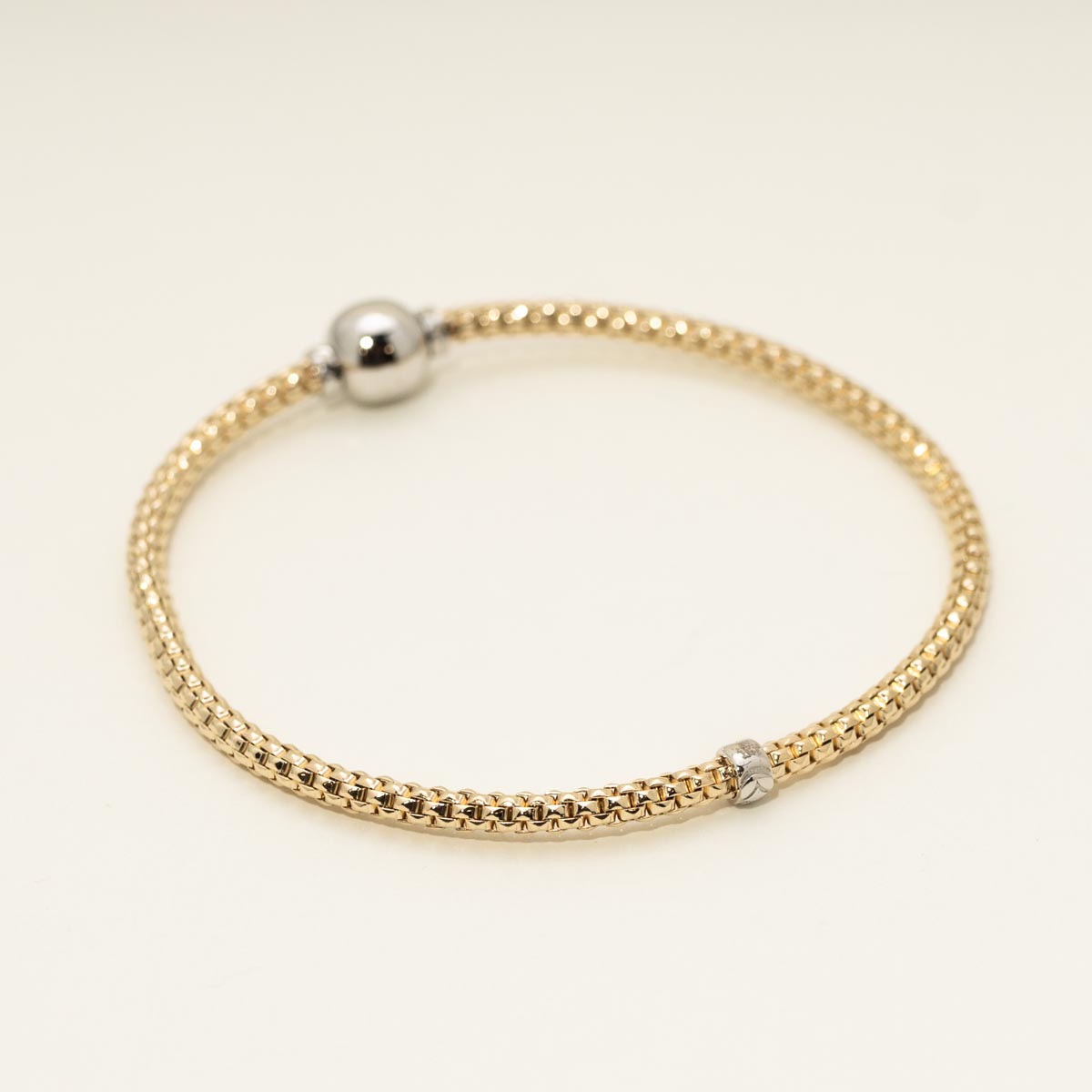 Italian Woven Bracelet in 14kt Yellow Gold with 14kt White Gold Accents