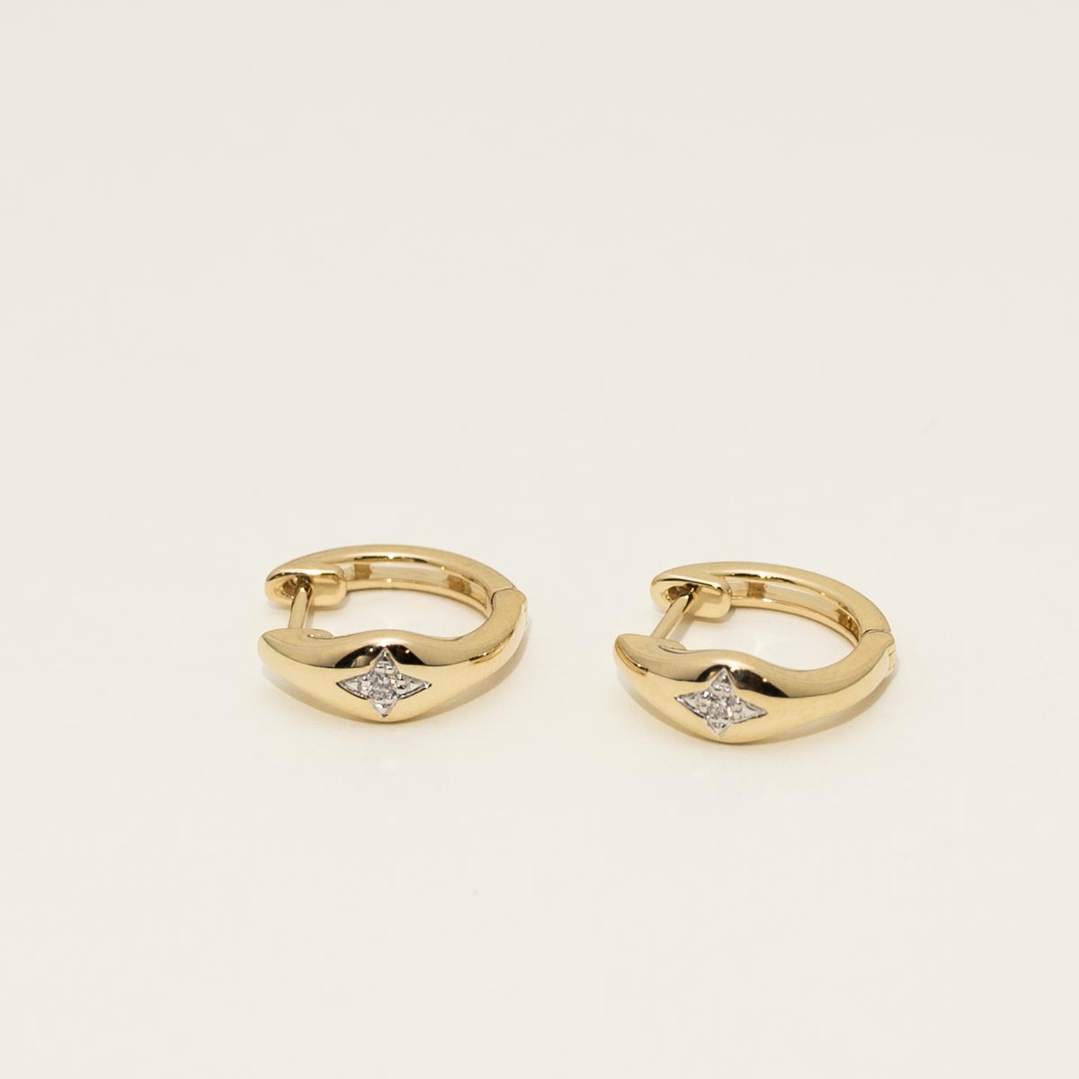 Diamond Star Hoop Earrings in 14kt Yellow Gold (1/20ct tw)