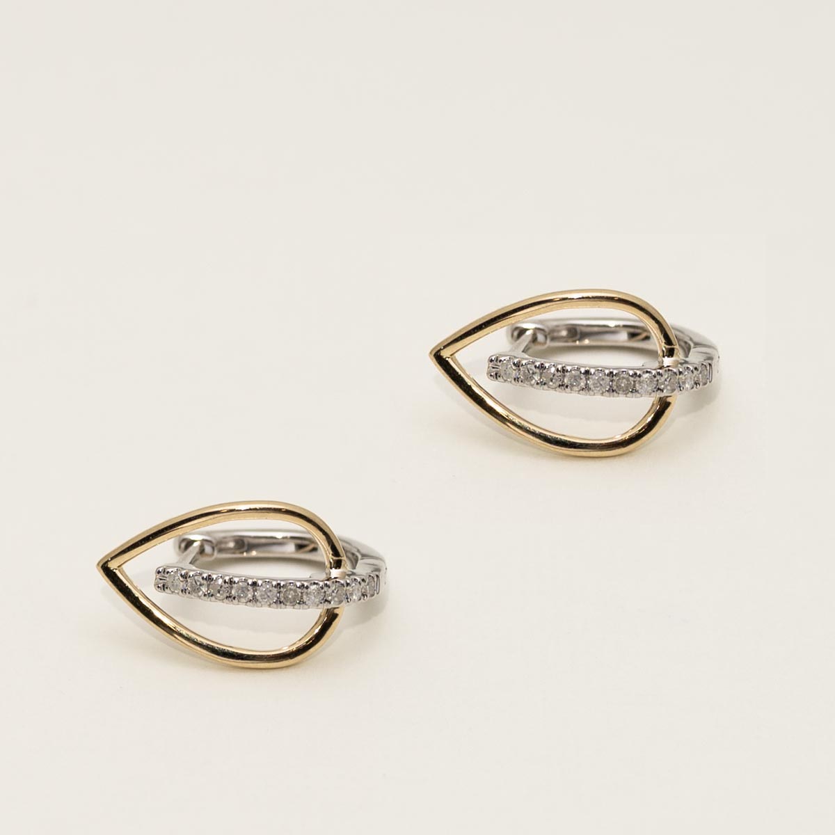 Open Pear Diamond Hoop Earrings in 10kt Yellow and White Gold (1/7ct tw)