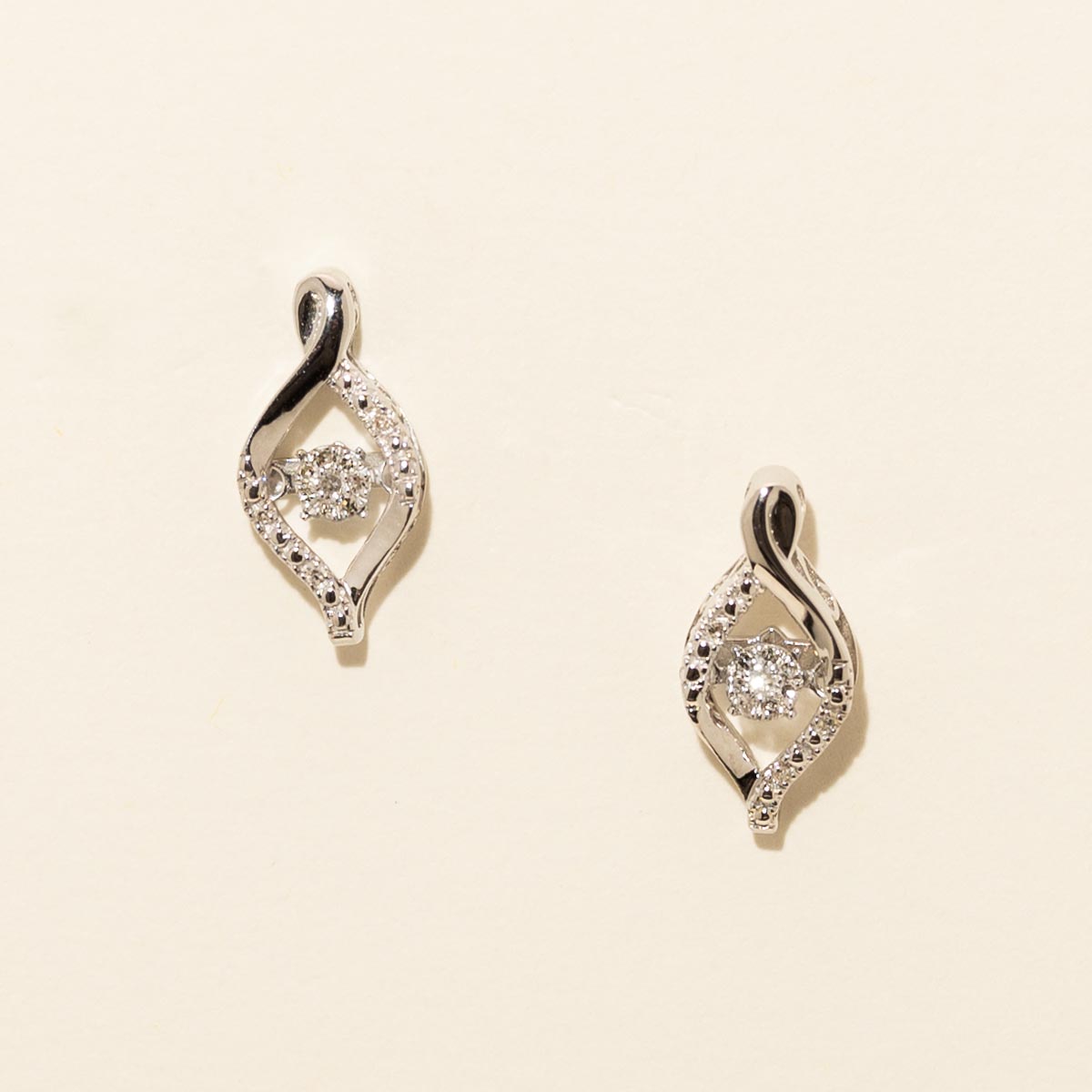 Rhythm of Love Diamond Earrings in Sterling Silver (1/10ct tw)