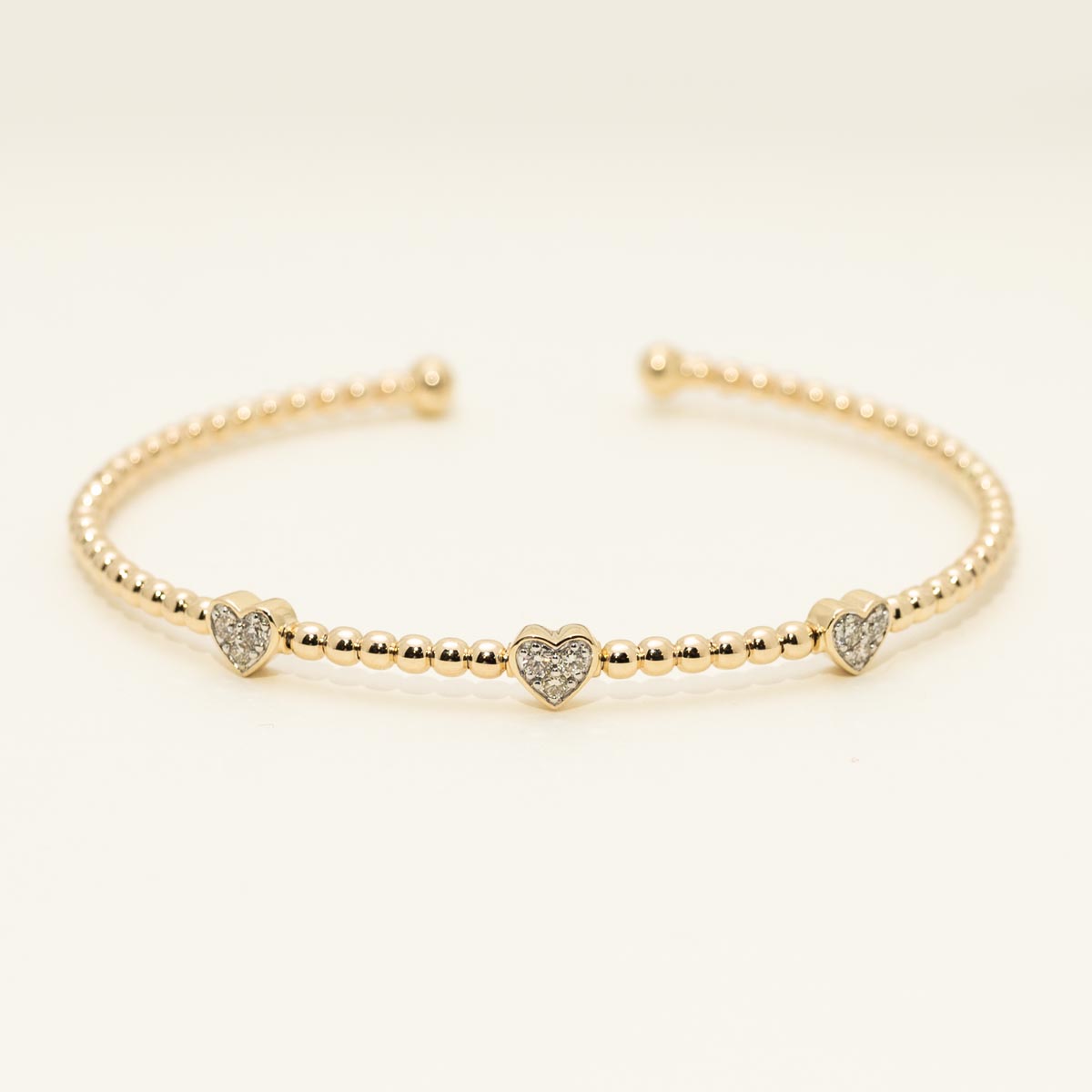 Diamond Heart Flexible Cuff Bracelet in 10kt Yellow Gold (1/4ct tw)