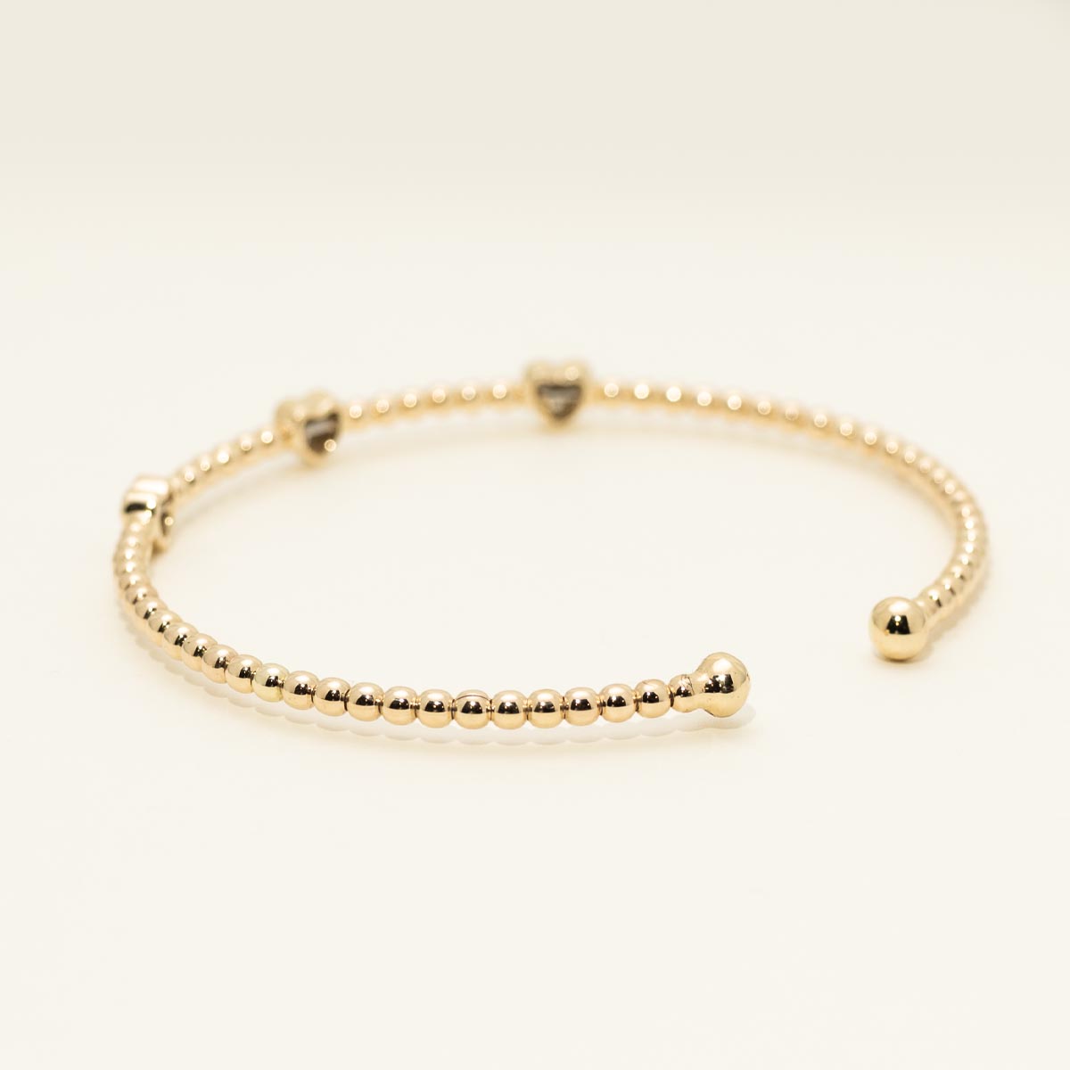 Diamond Heart Flexible Cuff Bracelet in 10kt Yellow Gold (1/4ct tw)