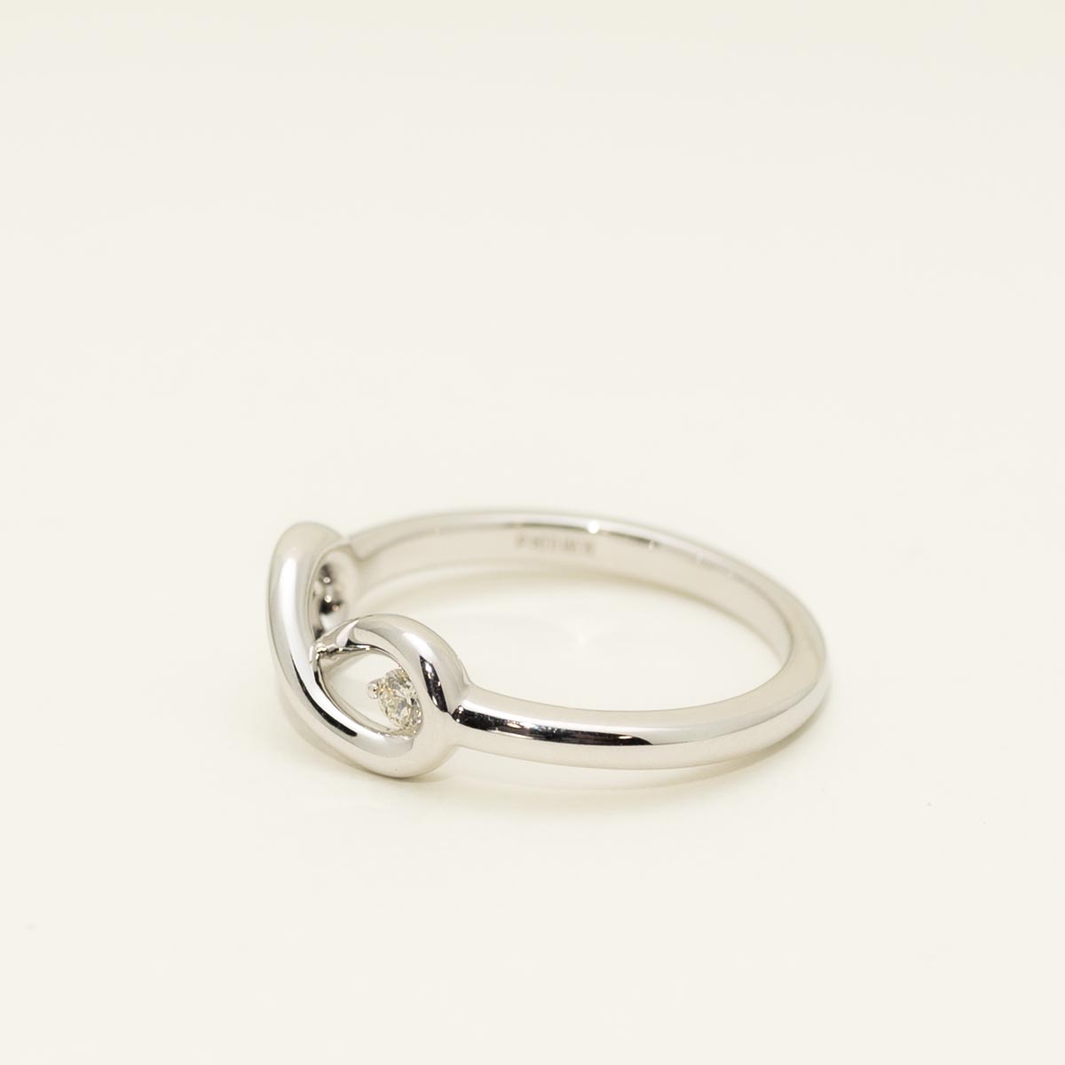 Northern Star Diamond Love Knot Infinity Ring in Sterling Silver (.04ct)