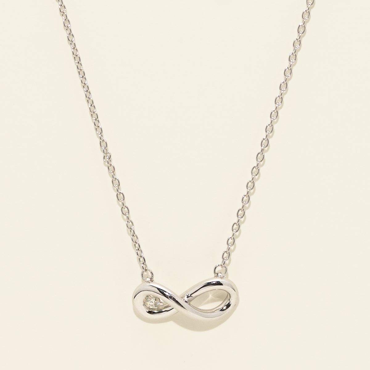 Northern Star Diamond Love Knot Infinity Necklace in Sterling Silver (.04ct)